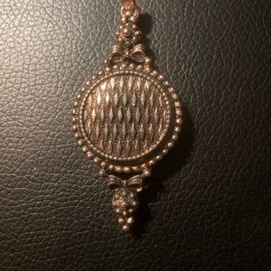 Not really sure about details on this piece assume it’s antique gold